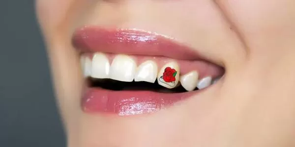 طرح زیبای تاتو دندان